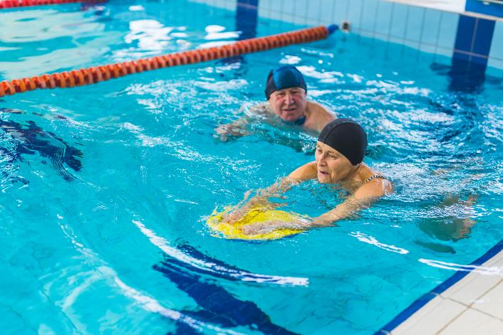 woman using floatation device
