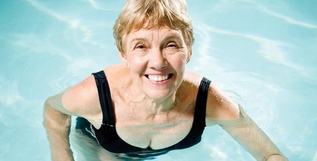 older lady swimming in pool