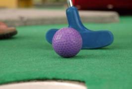 minigolf ball and club