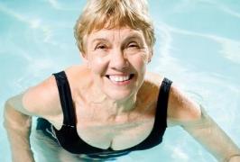 older lady swimming in pool